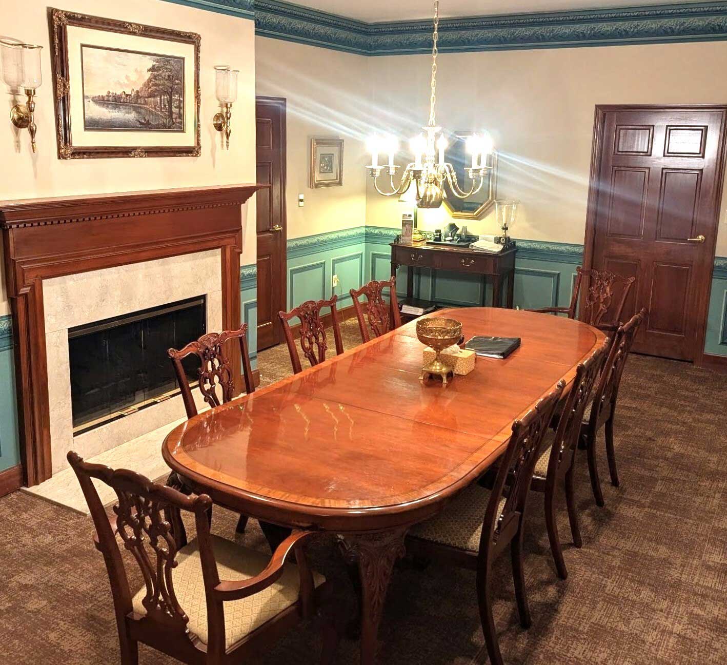 Another view of the arrangement room with the fireplace in view.